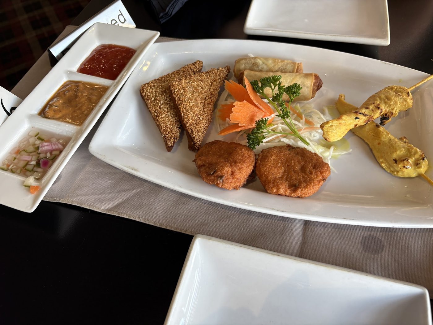 A starter platter with dipping sauces